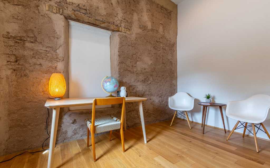 Sometimes an adobe wall is left in it's raw state after a restoration work to show off the humble but beautiful material